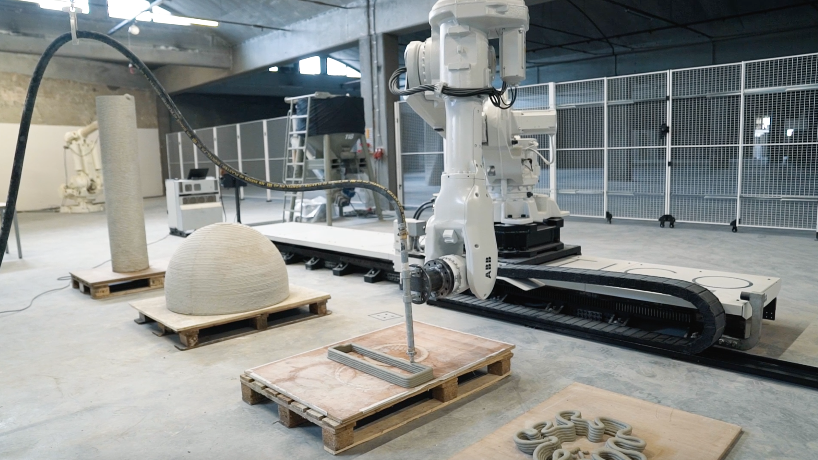 Vertico's specially designed robotic arm operating at the new Eindhoven facility. Image via Vertico.